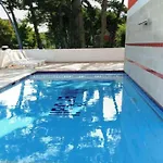 Relax And Unwind By The Pool In